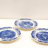 Elegant set of three vintage blue and white decorative plates showcasing intricate transferware designs.