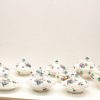 Elegant floral porcelain containers, beautifully designed for decorative and serving purposes.