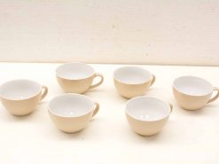 Elegant beige and white cappuccino cups set of six for stylish beverage serving.