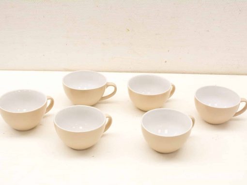 Elegant beige and white cappuccino cups set of six for stylish beverage serving.