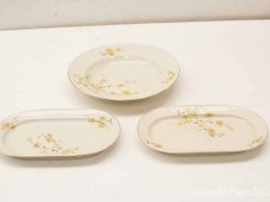 Elegant vintage porcelain serving set with floral design for special occasions and decor.