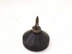 Vintage spirit level plumb bob for accurate vertical measurements in woodworking and construction.