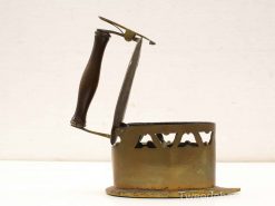 Antique brass kettle with unique design and wooden handle, perfect for vintage decor enthusiasts.