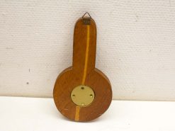 Unique wooden guitar decor piece for music lovers, showcasing craftsmanship and artistic flair.