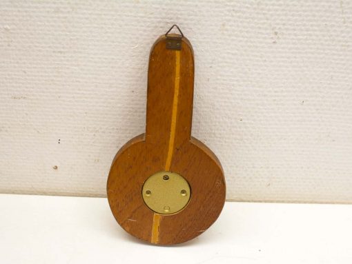 Unique wooden guitar decor piece for music lovers, showcasing craftsmanship and artistic flair.