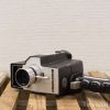 Vintage Bell Howell Zoom Reflex Camera with classic design and manual controls for collectors.
