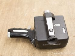 Vintage Bell Howell Zoom Reflex film camera with elegant design and nostalgic appeal.