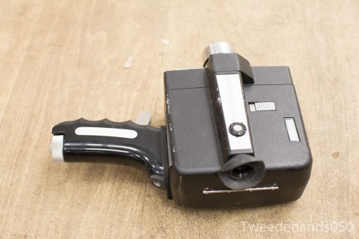 Vintage Bell Howell Zoom Reflex film camera with elegant design and nostalgic appeal.