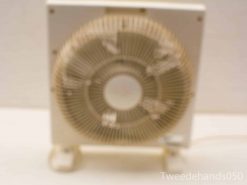 Vintage box fan for stylish air circulation and cooling in any room.