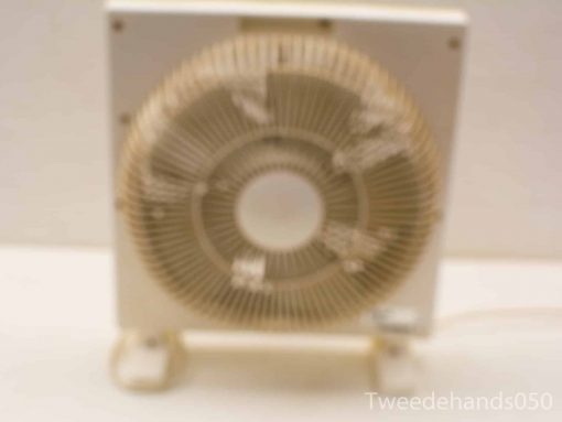 Vintage box fan for stylish air circulation and cooling in any room.