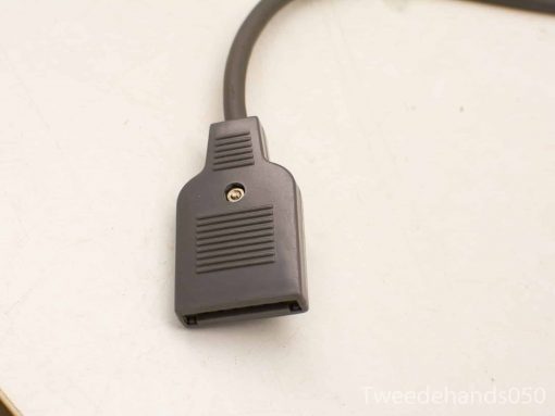 Vintage gray cable connector for reliable performance in electronics and automotive applications.
