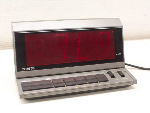 Cresta retro alarm clock with bright red display and classic design for stylish bedrooms.