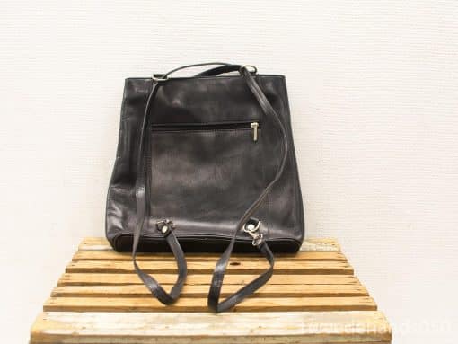 Elegant black handbag with adjustable straps and exterior pocket, perfect for any occasion.