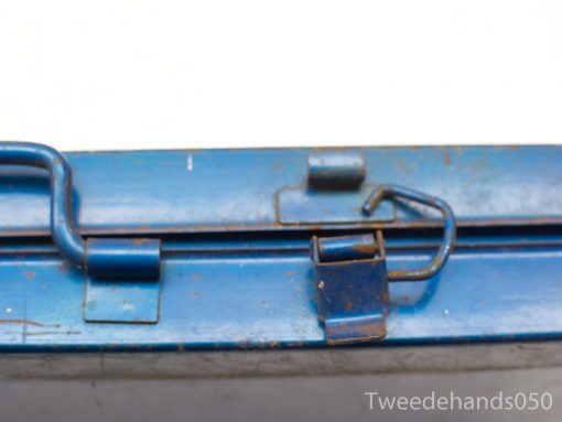 Vintage blue metal latch with unique wear, perfect for securing doors or containers.