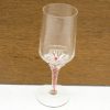 Elegant champagne flute with twisted stem and floral design, perfect for special occasions.