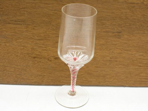 Elegant champagne flute with twisted stem and floral design, perfect for special occasions.