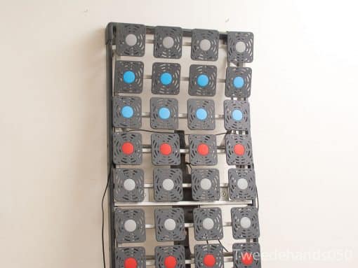 Colorful buttons on a steel panel, ideal for interactive gaming or educational displays.