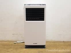 Portable air conditioner with sleek white and black design, perfect for indoor cooling in small spaces.