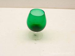 Elegant green glass goblet with a clear stem, perfect for drinks or decorative display.
