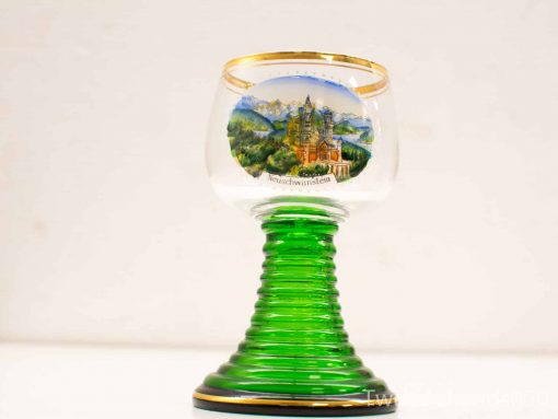 Decorative Neuschwanstein Castle glass with green ribbed base, perfect for collectors and souvenirs.