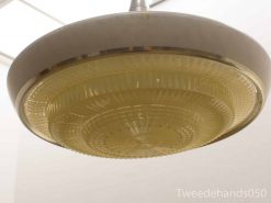 Elegant retro ceiling lamp with glass diffuser perfect for timeless modern interiors.