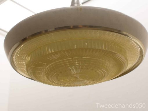 Elegant retro ceiling lamp with glass diffuser perfect for timeless modern interiors.