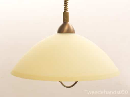 Elegant vintage pendant lamp with frosted glass shade and bronze accents, perfect for any space.
