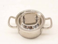 Stylish stainless steel pot with lid, perfect for versatile cooking and modern kitchens.