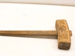 Vintage wooden mallet with authentic patina, ideal for craftsmanship and everyday use.