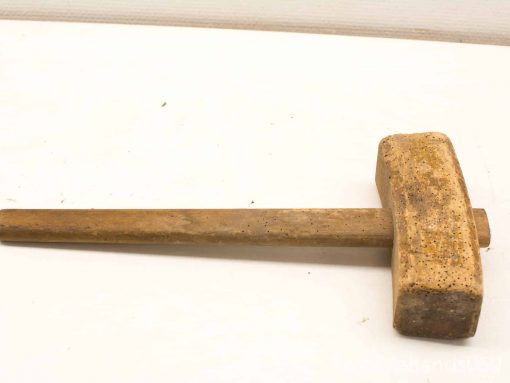 Vintage wooden mallet with authentic patina, ideal for craftsmanship and everyday use.