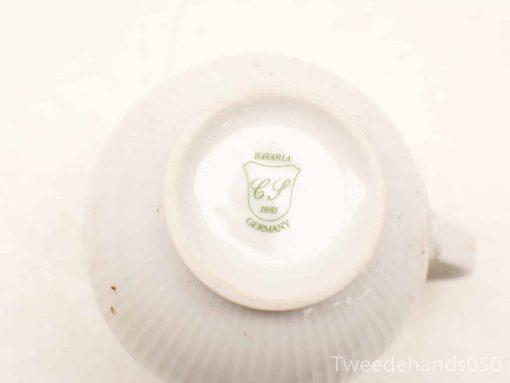 Vintage Bavaria porcelain teacup with CS initials, 1881, featuring elegant ribbed design.
