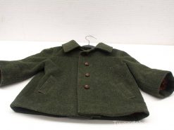 Vintage green wool jacket with oversized fit, large pockets, and button detailing. Perfect for style!