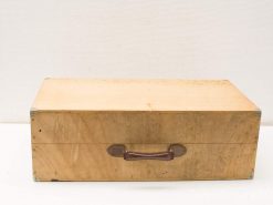 Vintage wooden storage box with metal accents and leather handle, perfect for retro enthusiasts.