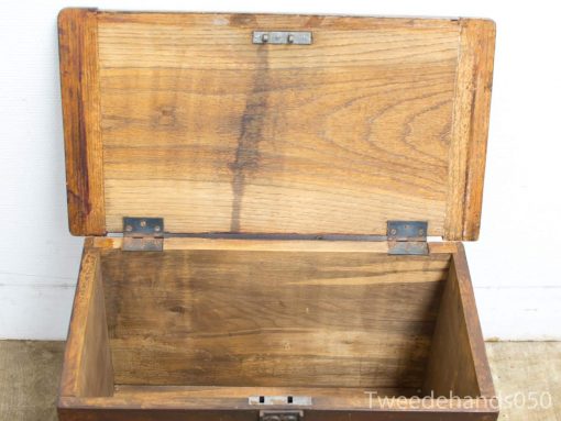 Beautiful wooden chest with open lid, perfect for vintage storage and decor.