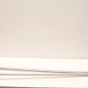 Lightweight aluminum crutches with red grips for mobility support and comfort.