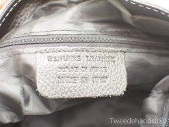 Elegant gray Italian leather bag with premium quality craftsmanship and genuine leather tag.