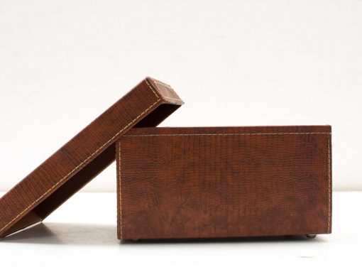 Elegant brown leather box for jewelry storage and cherished keepsakes.