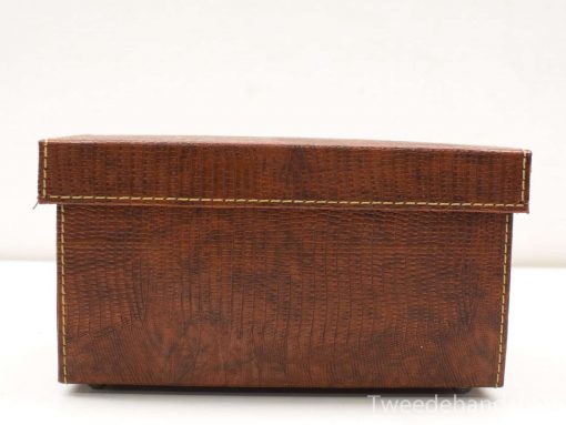 Elegant brown vintage faux leather storage box with fine stitching, perfect for decor and organization.