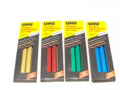 UHU glitter glue sticks in gold, red, green, and blue for vibrant crafting and projects.