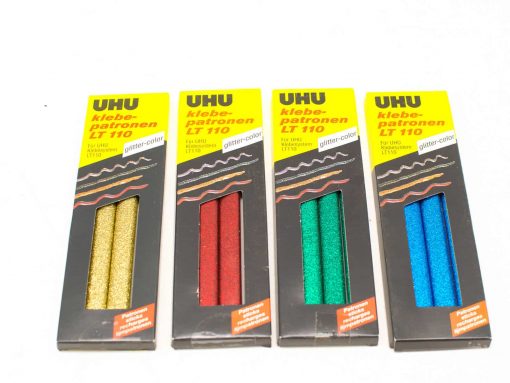 UHU glitter glue sticks in gold, red, green, and blue for vibrant crafting and projects.
