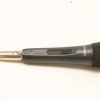 Vintage black handheld microphone for professional sound in live performances and studio recordings.