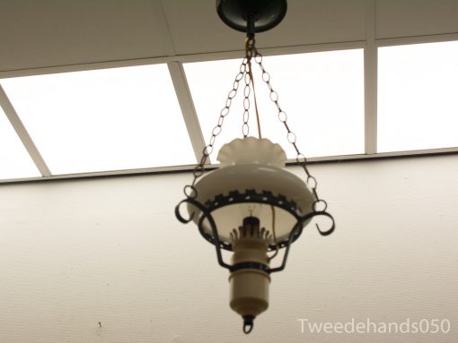 Elegant vintage chandelier with frosted glass shade, adding charm and warmth to any space.