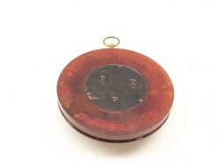 Vintage wooden and metal balance scale with elegant brass accents, perfect for collectors.