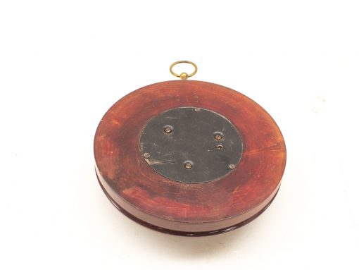Vintage wooden and metal balance scale with elegant brass accents, perfect for collectors.