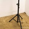 Professional adjustable tripod for photography and videography with sturdy rubber feet.