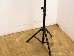 Professional adjustable tripod for photography and videography with sturdy rubber feet.