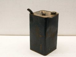 Vintage oil can with weathered finish, perfect for collectors and industrial decor enthusiasts.