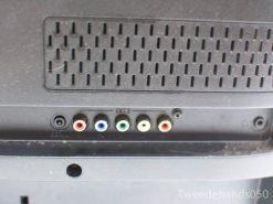 Close-up of Philips TV rear panel with connections and ventilation ports for versatile use.
