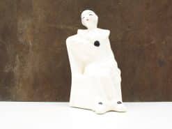 Elegant porcelain Pierrot clown figurine, vintage charm and whimsical design for collectors.