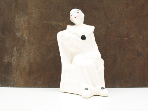 Elegant porcelain Pierrot clown figurine, vintage charm and whimsical design for collectors.